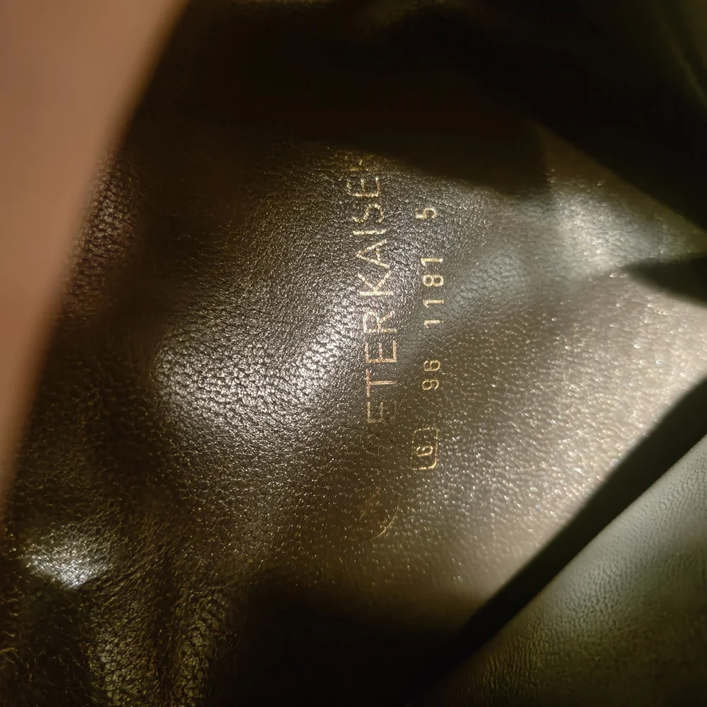 Stylish Black Knee-High Boots with Metallic Accents - Picture 3 of 4
